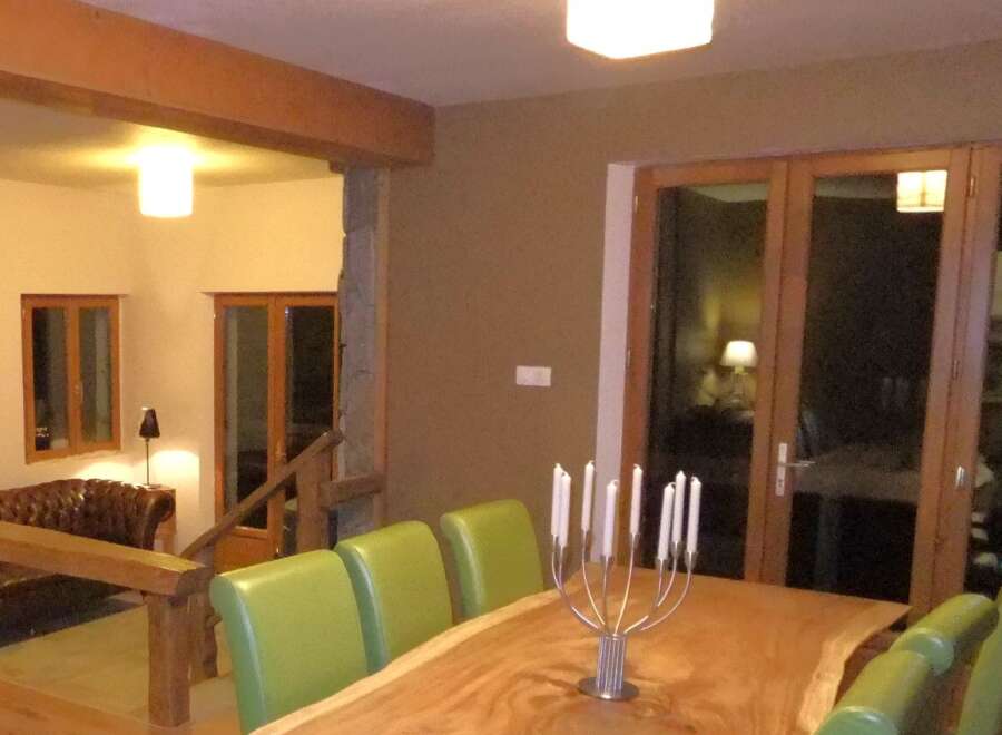This stunning property boasts a beautifully designed dining area, perfect for hosting gatherings.