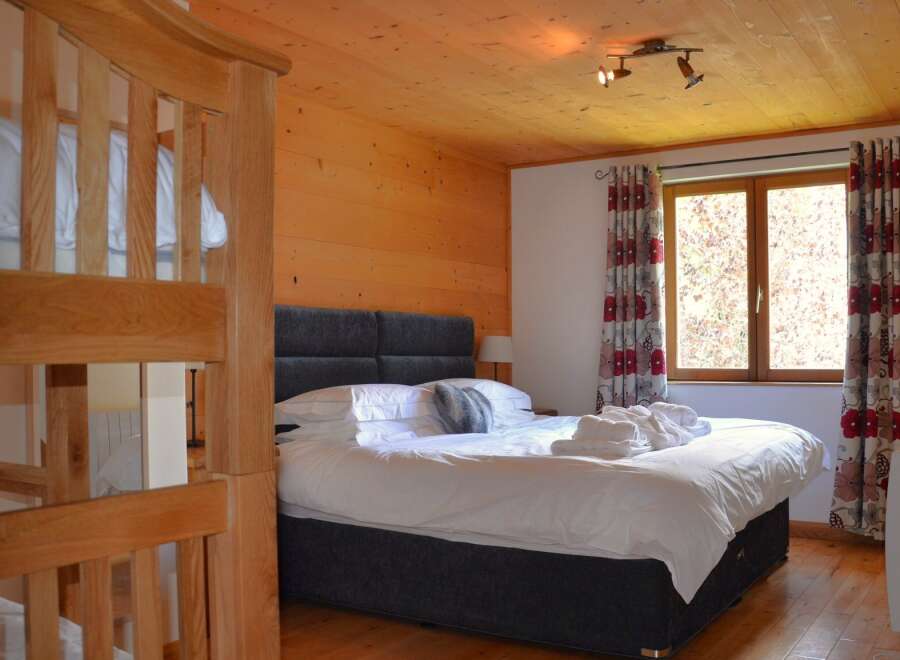 Experience comfort and style in this inviting bedroom.