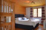 Experience comfort and style in this inviting bedroom.