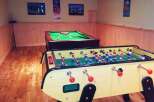 This property boasts a fantastic game room, perfect for entertaining and relaxation.