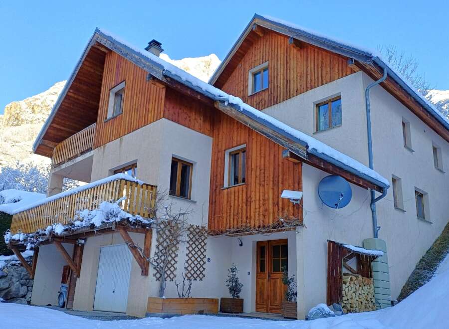 Discover the charm of this stunning chalet nestled in a winter wonderland.