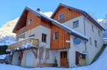 Discover the charm of this stunning chalet nestled in a winter wonderland.