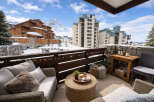Enjoy breathtaking mountain views from this stunning balcony.