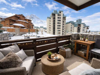 Enjoy breathtaking mountain views from this stunning balcony.