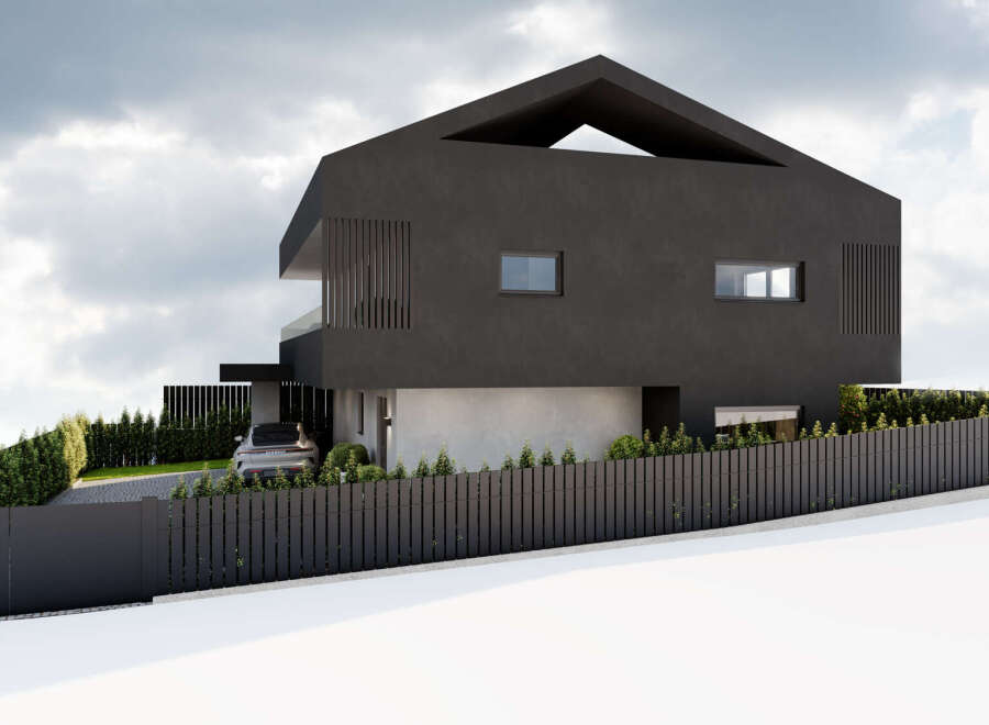This modern architectural marvel showcases a sleek, dark facade and a unique roof design.