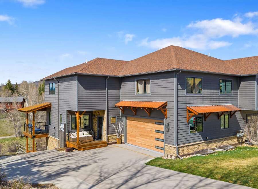 This stunning property boasts a modern design with a beautiful exterior.