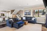 Step into luxury with this stunning property featuring a spacious living area perfect for entertaining.