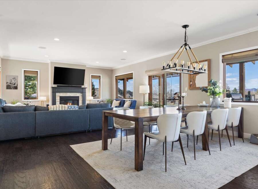This stunning property boasts a spacious open-concept living and dining area, perfect for entertaining.