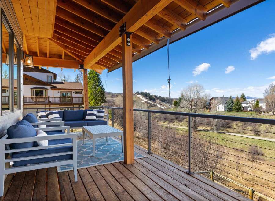 Enjoy breathtaking views from this stunning outdoor living space.