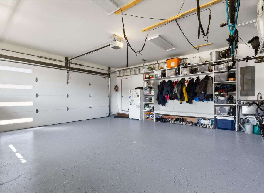 This spacious garage offers ample storage and organization solutions.