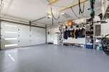 This spacious garage offers ample storage and organization solutions.