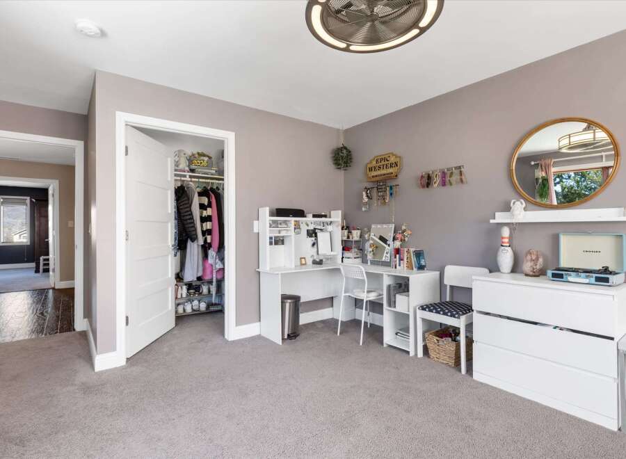 Step into this inviting bedroom, featuring a spacious layout and neutral color palette.