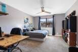 This inviting bedroom boasts a serene atmosphere, perfect for relaxation.