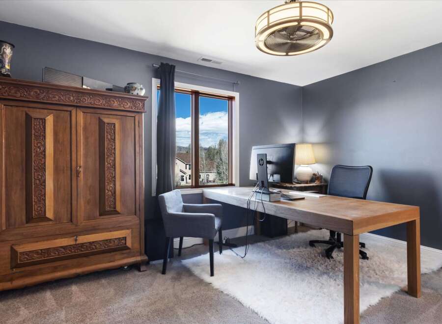 This home office exudes sophistication and functionality.