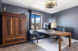 This home office exudes sophistication and functionality.