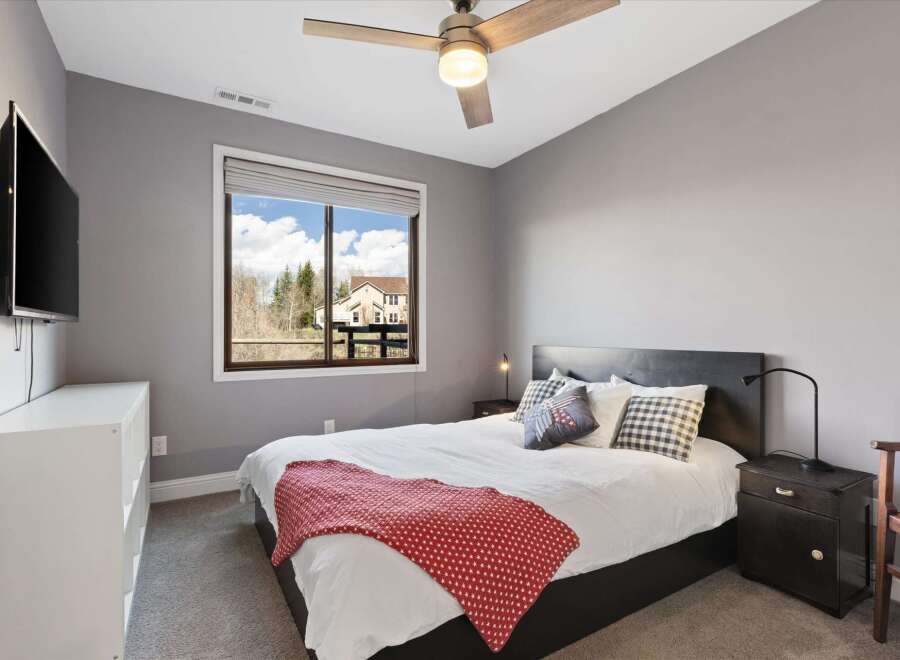 This bedroom offers a cozy and inviting atmosphere, perfect for relaxation.