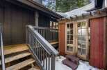 Discover the charm of this stunning property, featuring a beautifully designed exterior with rustic wooden accents.