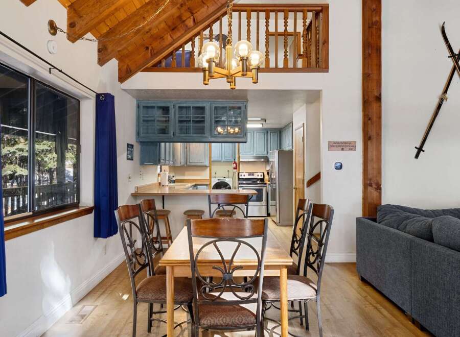 This charming property boasts a cozy dining area, perfect for family gatherings or intimate meals.
