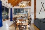 This charming property boasts a cozy dining area, perfect for family gatherings or intimate meals.