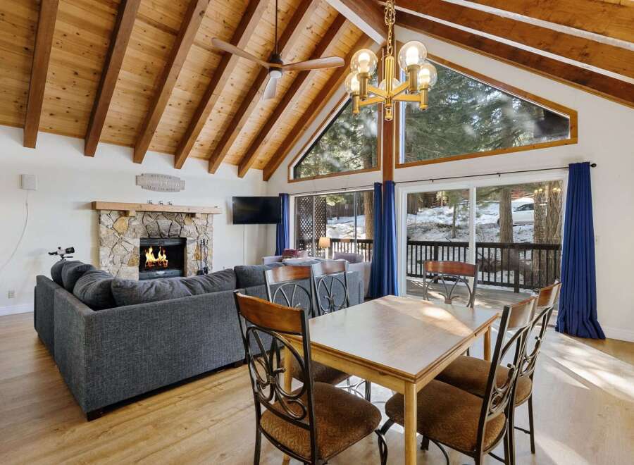 Experience the charm of this stunning property, featuring a cozy fireplace and a spacious living area.