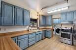This stunning kitchen boasts a beautiful blend of style and functionality.