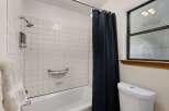 Step into this inviting bathroom, featuring a clean and modern design.