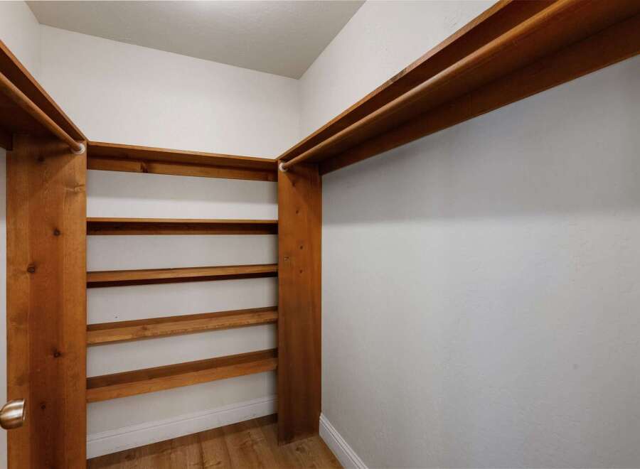 Discover the perfect storage solution in this well-designed closet.