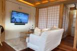 This cozy living space features a modern design with a touch of natural elements.