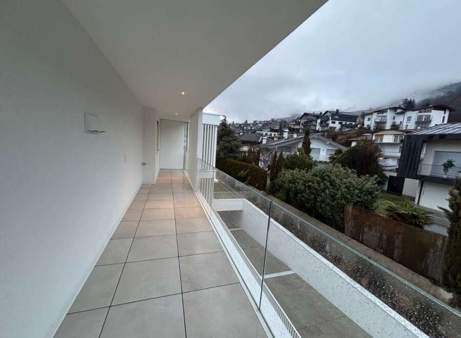 Enjoy breathtaking views from this modern balcony.