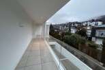 Enjoy breathtaking views from this modern balcony.