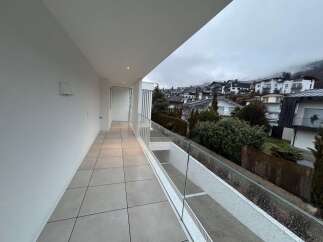 Enjoy breathtaking views from this modern balcony.