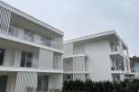 Discover modern living in these stunning white apartment buildings.