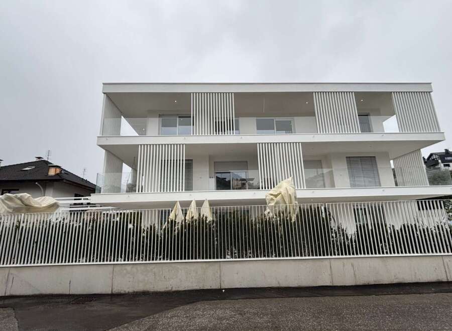 Discover modern living in this stunning white multi-story property.