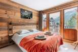Experience the ultimate in alpine luxury with this stunning bedroom.