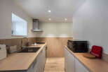 This modern kitchen boasts sleek design and functionality.