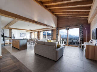 Experience luxury living in this stunning property, featuring a spacious open-plan layout perfect for entertaining.