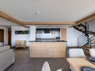 This stunning property boasts a modern kitchen with a large island, perfect for entertaining.