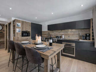 Experience luxury living in this stunning kitchen! Featuring a modern design with wooden accents, this space is perfect for both cooking and entertaining.