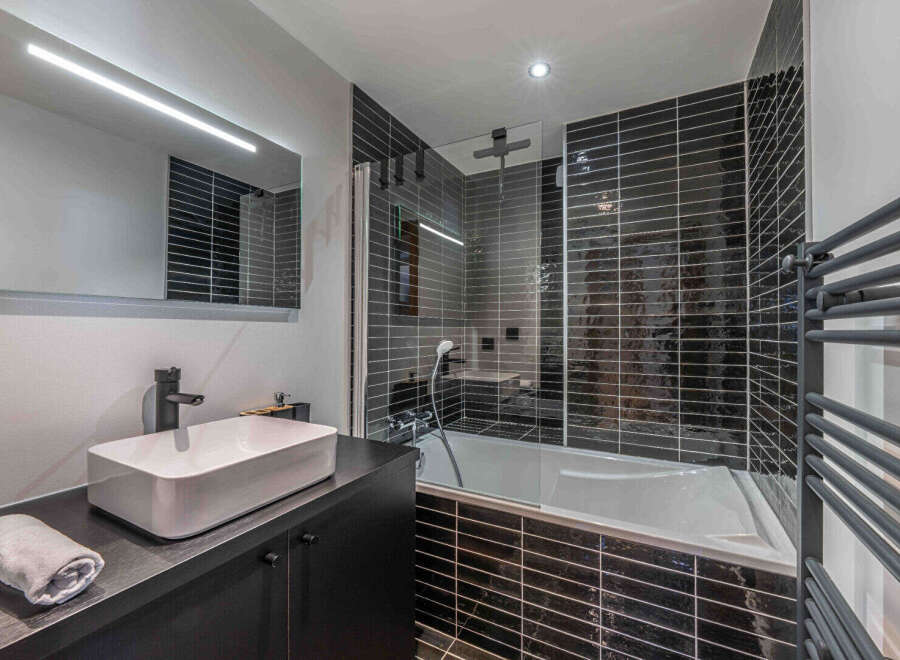 Step into modern luxury with this stunning bathroom.