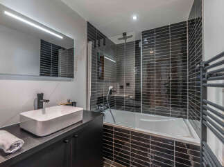 Step into modern luxury with this stunning bathroom.