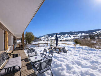 Enjoy breathtaking mountain views from this charming property.