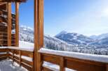 Experience the ultimate winter escape with this stunning property, offering breathtaking views of snow-capped mountains.