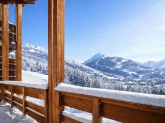 Experience the ultimate winter escape with this stunning property, offering breathtaking views of snow-capped mountains.