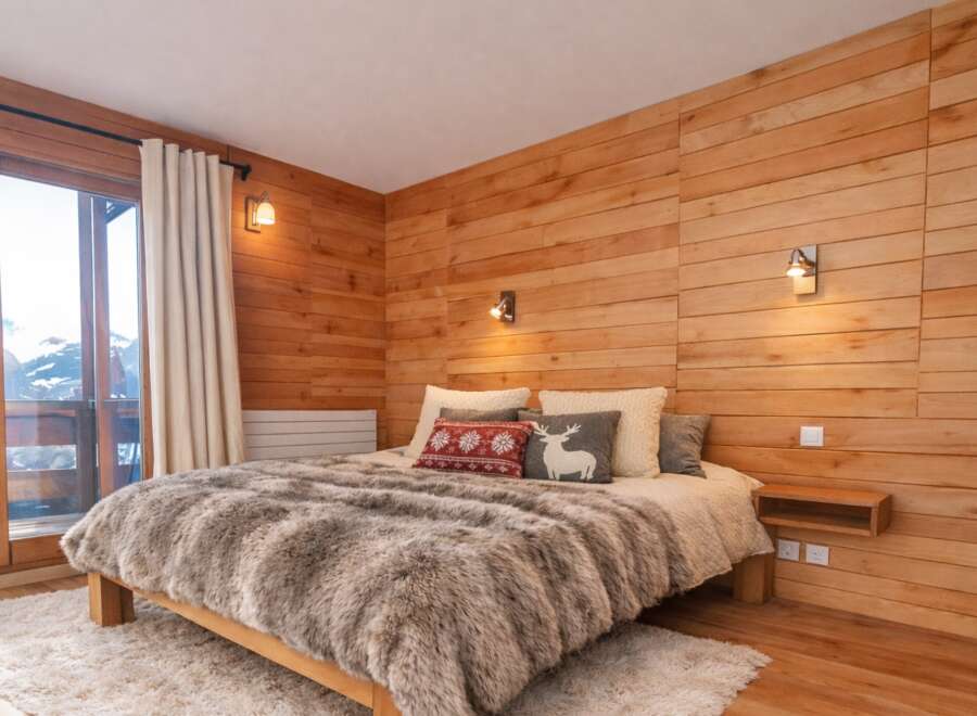 Experience the ultimate in cozy comfort in this stunning bedroom.