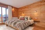 Experience the ultimate in cozy comfort in this stunning bedroom.