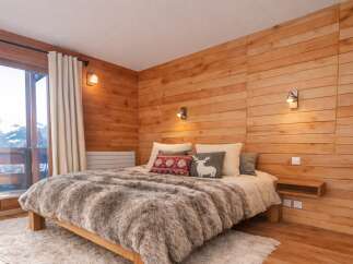 Experience the ultimate in cozy comfort in this stunning bedroom.