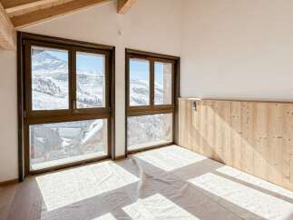 Experience breathtaking mountain views from this stunning property.