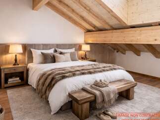 Experience the epitome of rustic elegance in this stunning bedroom.