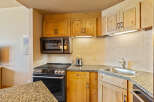 This charming kitchen boasts a modern design with sleek appliances and ample counter space.