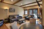 This stunning living space boasts a cozy atmosphere with its comfortable seating and inviting decor.